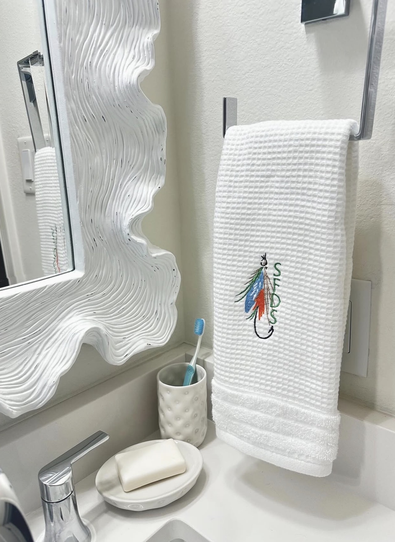 Fly fishing embroidered guest towel