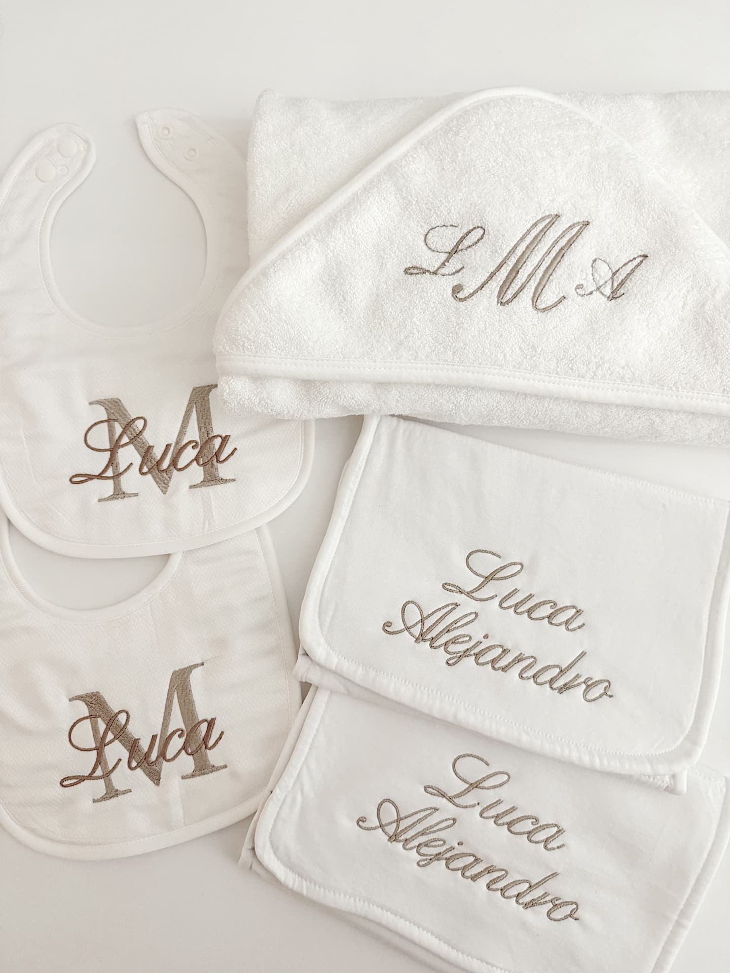 Monogrammed baby gift set with bibs, burp cloths and hooded towel