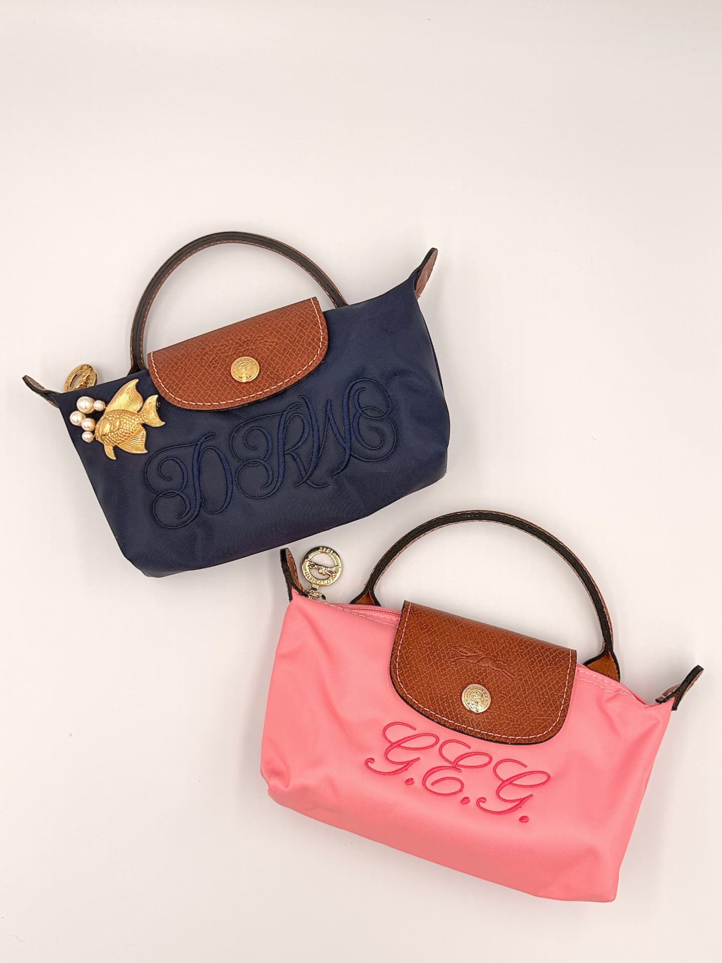 Navy and pink monogrammed nylon tote bags with script embroidery